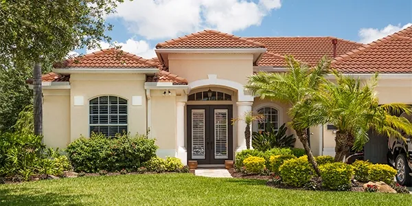 residential house with well maintained lawn